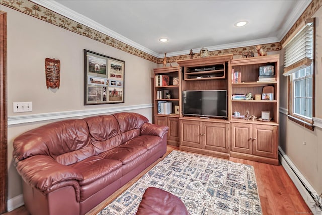 70 Cali Dr, Shelton, CT 06484 - living area featuring baseboard heating, baseboards, a wealth of natural light, and light wood-style floors