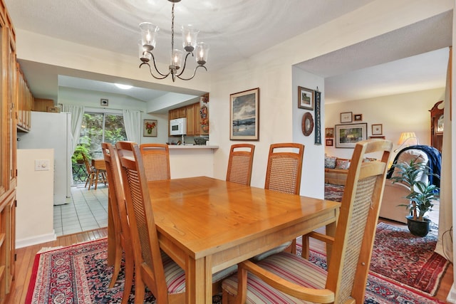 37 Wilton Crst, Wilton, CT 06897 - dining room with a chandelier and light wood finished floors