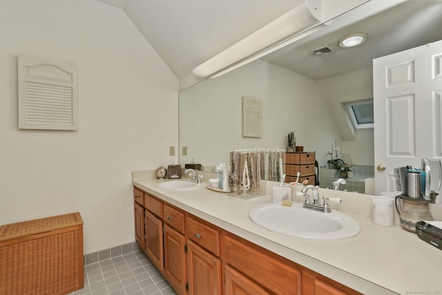 37 Wilton Crst, Wilton, CT 06897 - bathroom with lofted ceiling, double vanity, and tile patterned floors