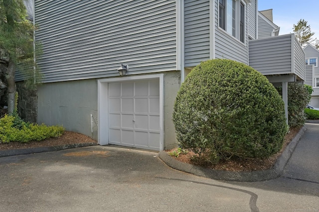 37 Wilton Crst, Wilton, CT 06897 - garage featuring asphalt driveway