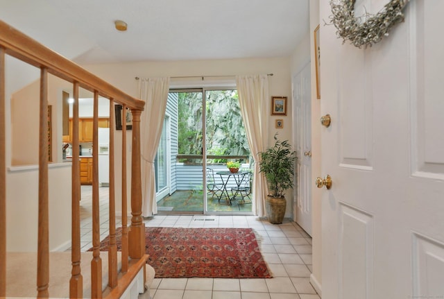 37 Wilton Crst, Wilton, CT 06897 - doorway to outside with light tile patterned floors and stairs