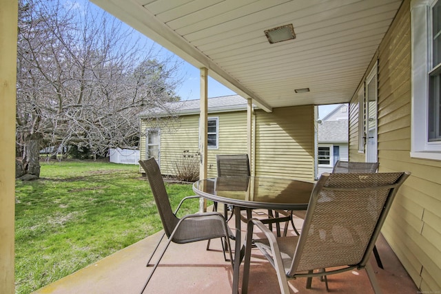 view of patio with outdoor dining area