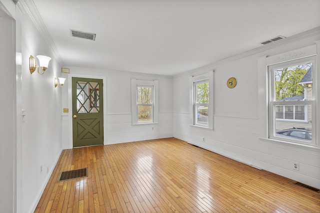 foyer with visible vents and light wood-style floors
