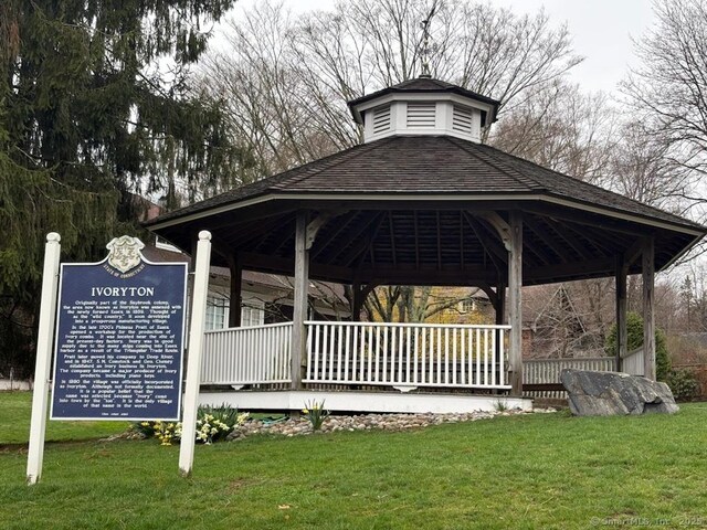 view of property's community featuring a gazebo and a lawn