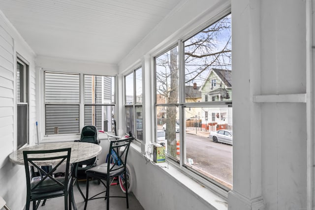 sunroom with ornamental molding