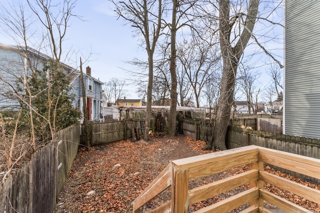view of yard with a fenced backyard