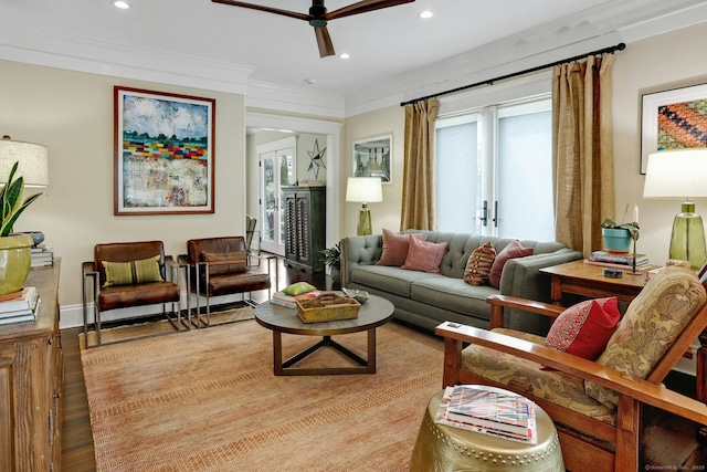 living room featuring ceiling fan, ornamental molding, wood finished floors, and recessed lighting