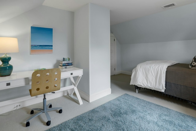 carpeted bedroom featuring vaulted ceiling, visible vents, and baseboards
