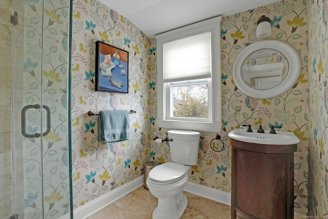 full bath featuring wallpapered walls, vanity, toilet, and baseboards