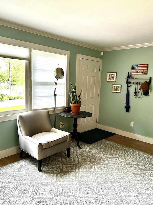 18 Paul St, Danbury, CT 06810 - living area featuring wood finished floors, baseboards, and crown molding