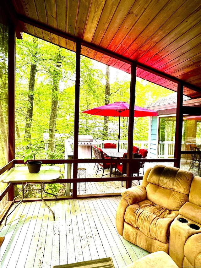 18 Paul St, Danbury, CT 06810 - sunroom / solarium featuring wooden ceiling, outdoor dining space, wood-type flooring, a wooden deck, and expansive windows