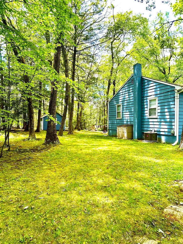 18 Paul St, Danbury, CT 06810 - view of grassy yard featuring cooling unit