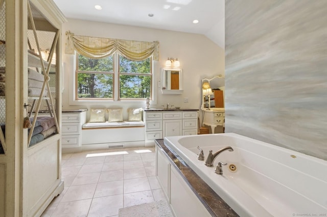 full bathroom with a whirlpool tub, tile patterned flooring, vanity, and recessed lighting