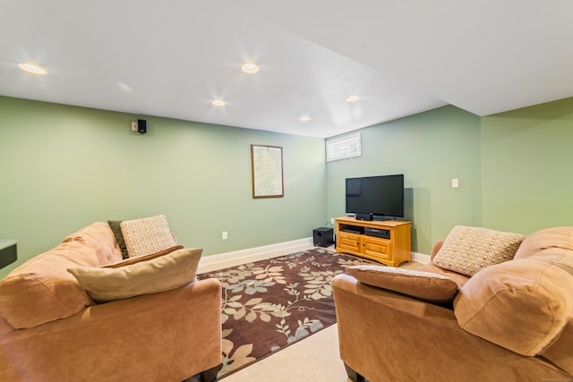 living area featuring tile patterned flooring, baseboards, and recessed lighting