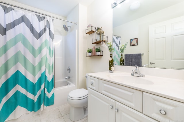full bathroom featuring tile patterned flooring, toilet, shower / tub combo, and vanity
