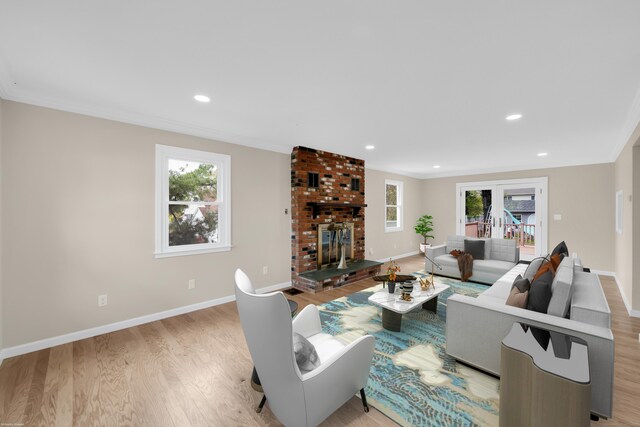 63 Rita Dr, Bristol, CT 06010 - living room with plenty of natural light, baseboards, light wood-style flooring, crown molding, and recessed lighting