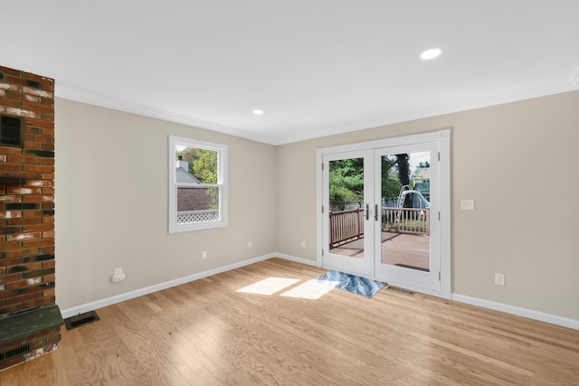 63 Rita Dr, Bristol, CT 06010 - empty room featuring ornamental molding, light wood finished floors, french doors, baseboards, and recessed lighting