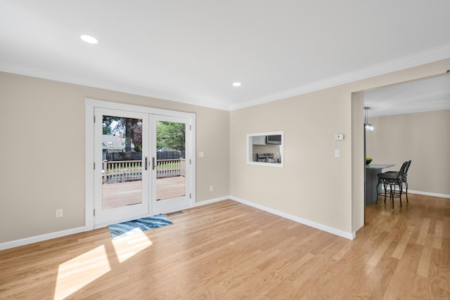 63 Rita Dr, Bristol, CT 06010 - doorway with ornamental molding, light wood-style floors, baseboards, french doors, and recessed lighting
