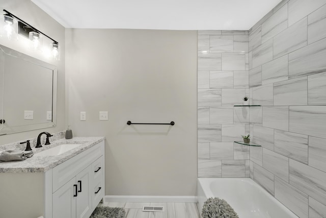 63 Rita Dr, Bristol, CT 06010 - bathroom featuring baseboards, vanity, and marble finish flooring