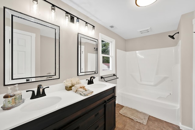 63 Rita Dr, Bristol, CT 06010 - full bath with double vanity and shower / washtub combination