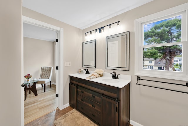 63 Rita Dr, Bristol, CT 06010 - full bath with baseboards and double vanity