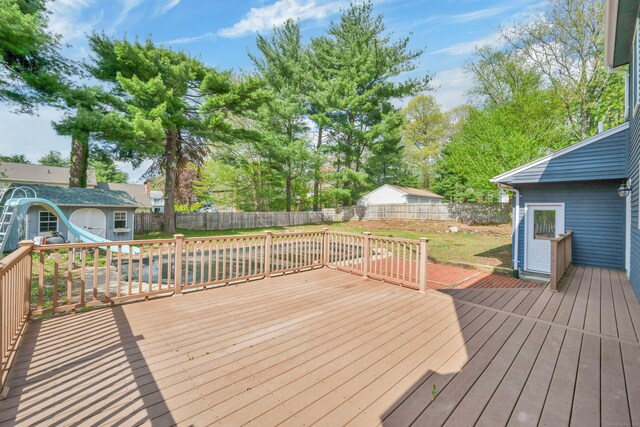 63 Rita Dr, Bristol, CT 06010 - wooden deck featuring view of wooded area