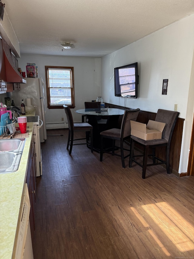 186 York St, West Haven, CT 06516 - dining room featuring dark wood-type flooring and a baseboard radiator