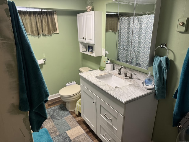 186 York St, West Haven, CT 06516 - bathroom featuring toilet, a shower with curtain, wood finished floors, and vanity