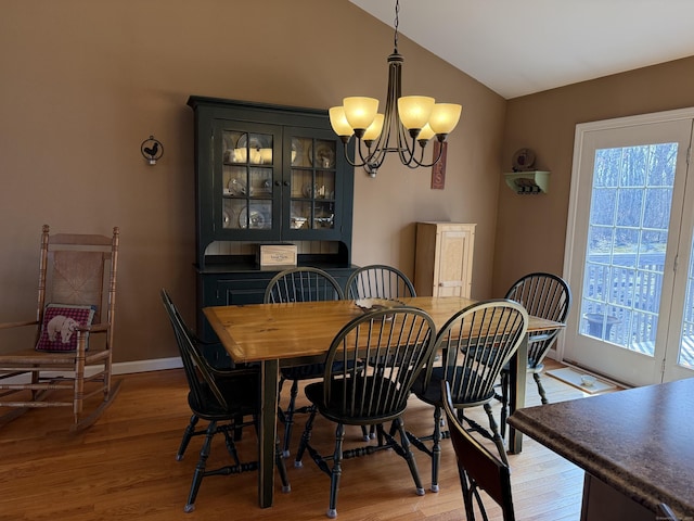 2 Anita Way, Warren, CT 06754 - dining space with a chandelier, lofted ceiling, light wood finished floors, and baseboards