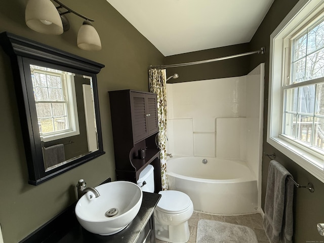 2 Anita Way, Warren, CT 06754 - bathroom with vaulted ceiling, toilet, shower / bathtub combination with curtain, tile patterned floors, and vanity