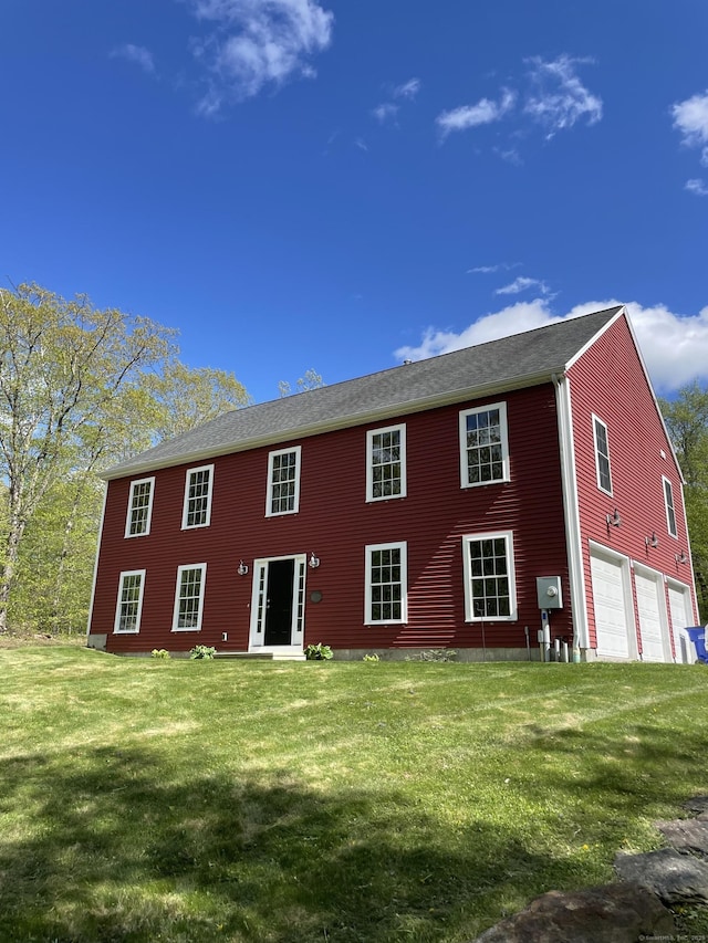 2 Anita Way, Warren, CT 06754 - rear view of property with a lawn and a garage