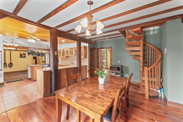 11 Glen Rd, Newtown, CT 06482 - dining area with stairway, hardwood / wood-style floors, a chandelier, beam ceiling, and ceiling fan