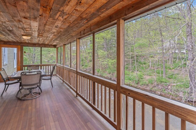 11 Glen Rd, Newtown, CT 06482 - unfurnished sunroom with outdoor dining area and a forest view