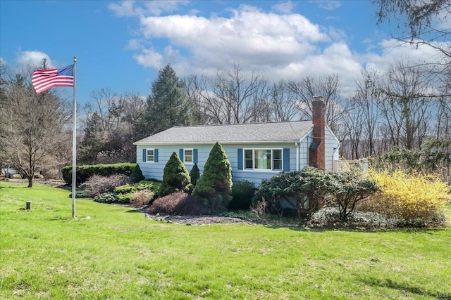 6 Pell Mell Dr, Bethel, CT 06801 - view of front facade with a front yard and a chimney