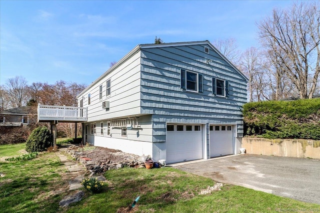 6 Pell Mell Dr, Bethel, CT 06801 - view of home's exterior featuring an attached garage and driveway