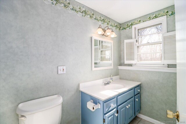 6 Pell Mell Dr, Bethel, CT 06801 - half bath with toilet, tile patterned floors, and vanity