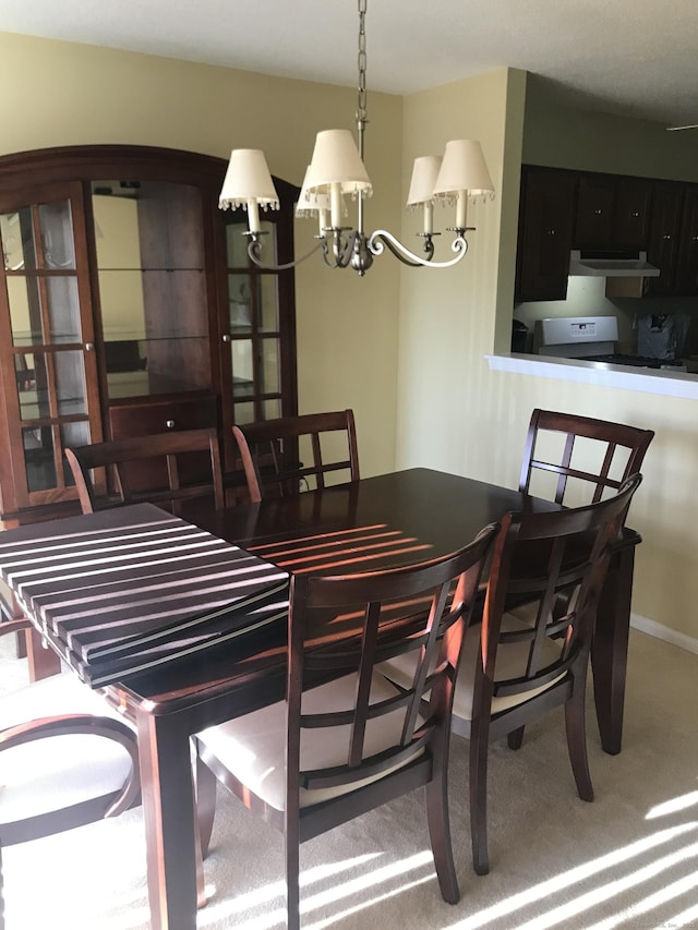 dining room featuring a notable chandelier