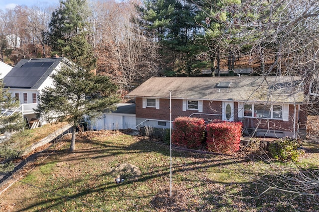 57 Bellevue Ter, Seymour, CT 06483 - back of house featuring crawl space, a yard, a garage, and brick siding