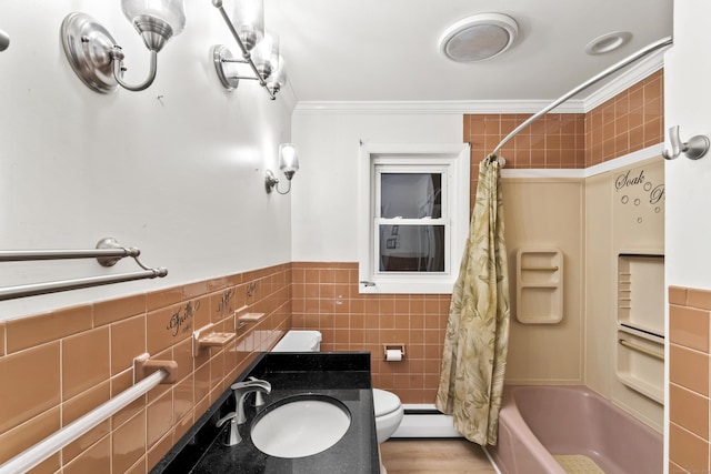 57 Bellevue Ter, Seymour, CT 06483 - full bathroom with a baseboard heating unit, ornamental molding, wainscoting, tile walls, and a sink
