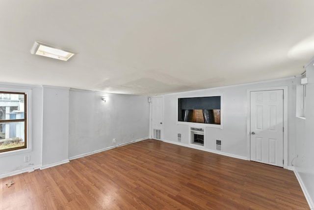 57 Bellevue Ter, Seymour, CT 06483 - unfurnished living room featuring visible vents, baseboards, and wood finished floors