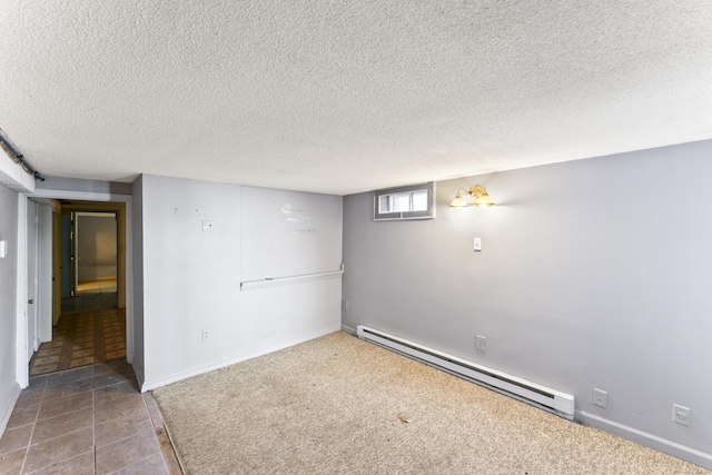 57 Bellevue Ter, Seymour, CT 06483 - basement featuring baseboard heating, a textured ceiling, carpet flooring, and baseboards