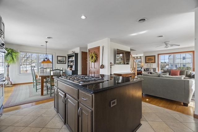 15 Buckingham Ave, Old Saybrook, CT 06475 - kitchen featuring stainless steel gas cooktop, a ceiling fan, light tile patterned floors, plenty of natural light, and recessed lighting