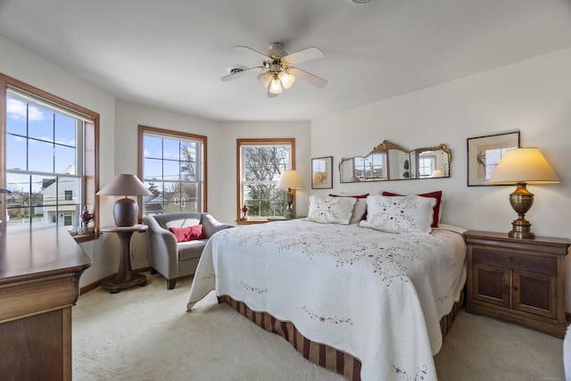 15 Buckingham Ave, Old Saybrook, CT 06475 - bedroom with light carpet, multiple windows, and a ceiling fan