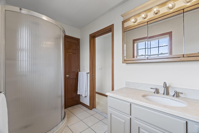 15 Buckingham Ave, Old Saybrook, CT 06475 - bathroom with a stall shower, vanity, and tile patterned flooring