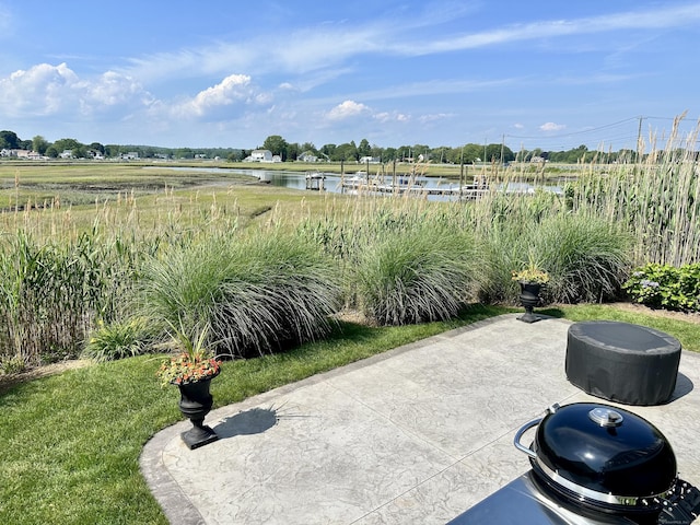 15 Buckingham Ave, Old Saybrook, CT 06475 - view of patio / terrace with a water view