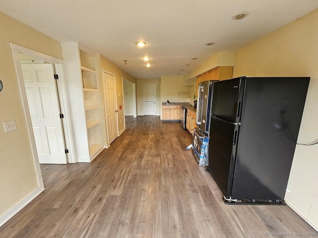 205 Flanders Rd, East Lyme, CT 06357 - kitchen with freestanding refrigerator, wood finished floors, stainless steel electric stove, baseboards, and recessed lighting