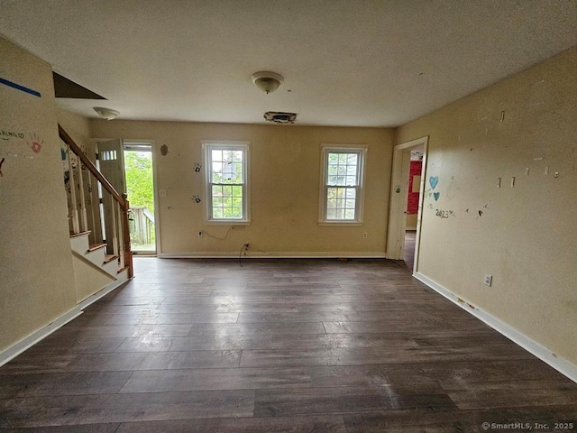 205 Flanders Rd, East Lyme, CT 06357 - entrance foyer with stairs, dark wood-style flooring, and baseboards