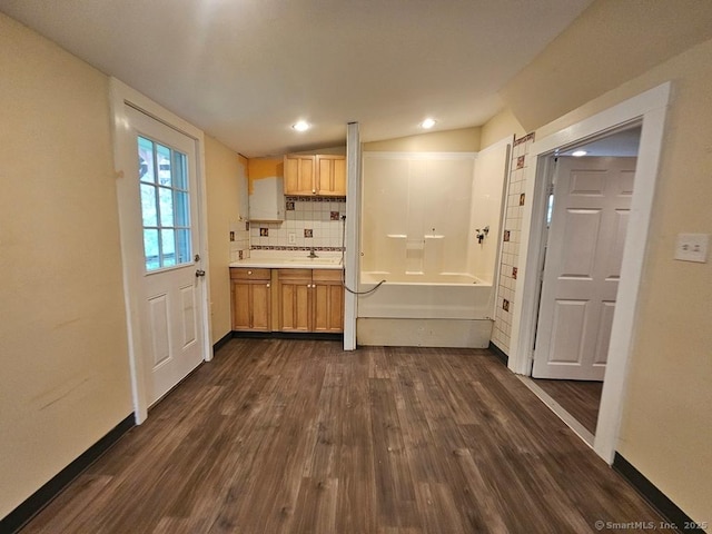 205 Flanders Rd, East Lyme, CT 06357 - kitchen with dark wood-style flooring, backsplash, recessed lighting, and light countertops