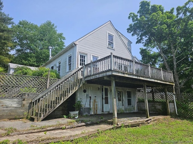 205 Flanders Rd, East Lyme, CT 06357 - back of house featuring a wooden deck and stairs