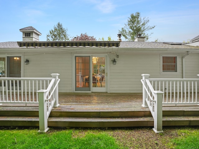 8 Argentine Way, Norwalk, CT 06850 - rear view of property featuring a chimney and a deck